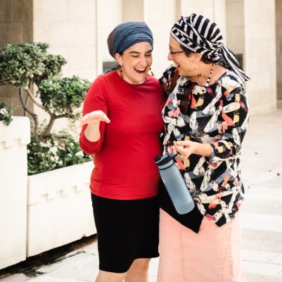 Two Women laughing on a walk