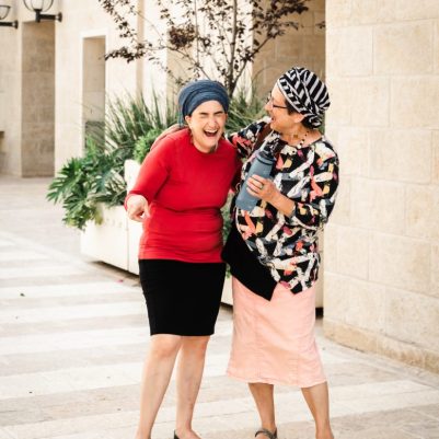 Friends laughing on a walk 2