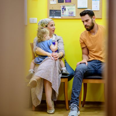 Family in waiting room 4