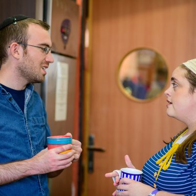 Couple drinking coffee in kitchen 3