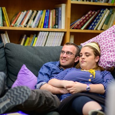 Young couple sitting on couch 2