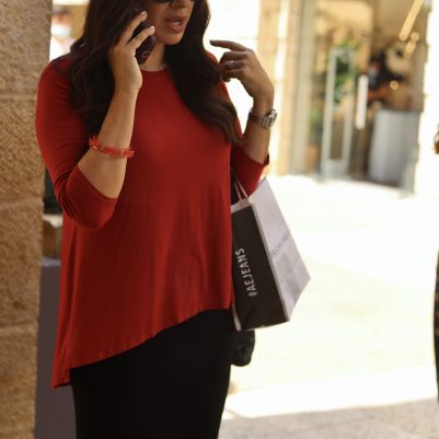 Woman talking on the phone in mall