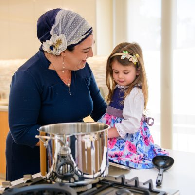 Mother and daughter cooking