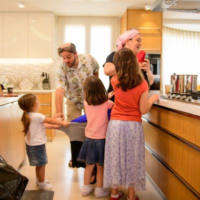 Children interrupting parents cooking