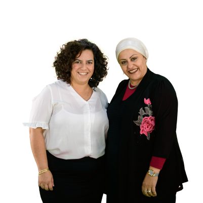 Two women smiling at camera