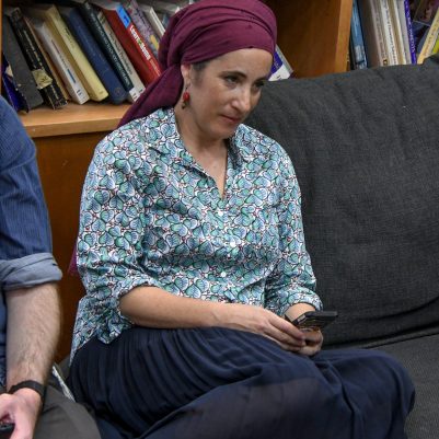 Woman sitting on couch