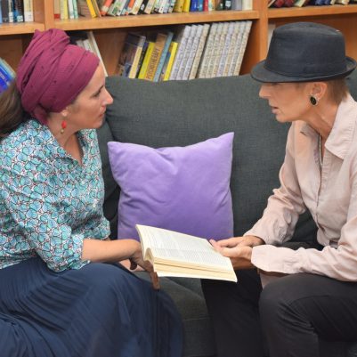 Women talking on couch 2