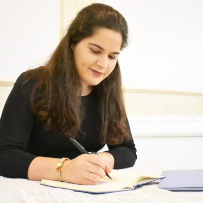 Woman writing on paper 2