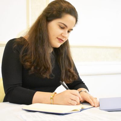 Woman writing on paper 3