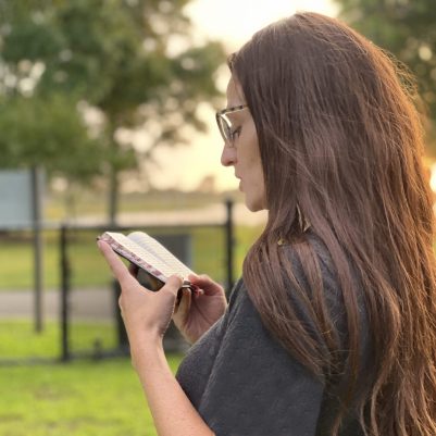 Woman praying outside