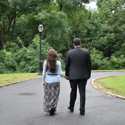 Couple holding hands on a walk 5