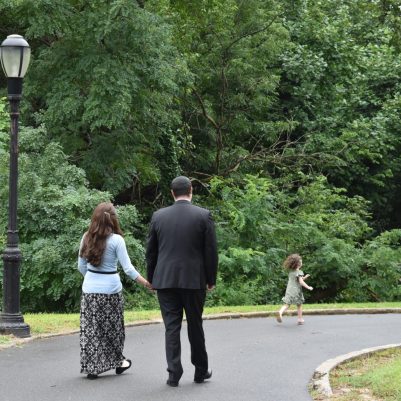 Couple holding hands on a walk 3
