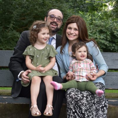 Family sitting on a bench