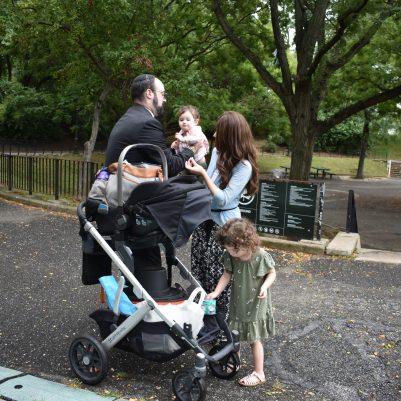 Family on a walk with young kids