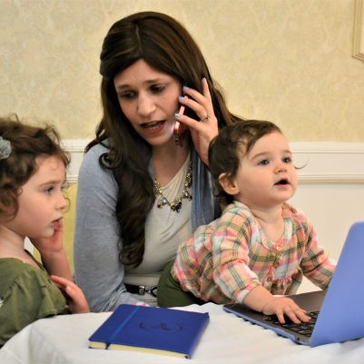 Mother on phone with kids interrupting