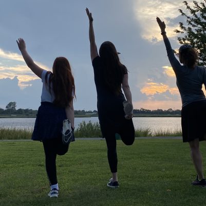 Women exercising in park