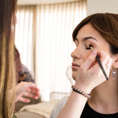 Makeup artist applying makeup