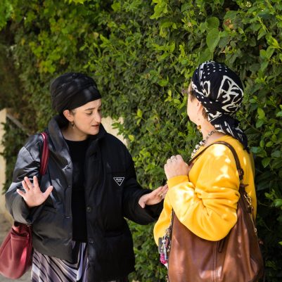 Women walking and talking 2