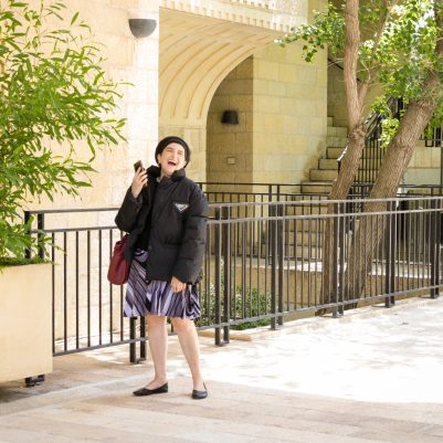 Woman on phone laughing