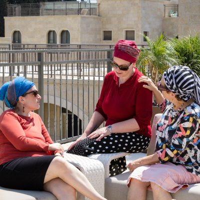 Women talking on porch