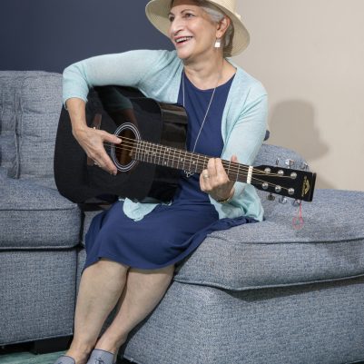 Woman playing guitar