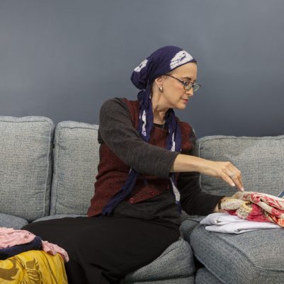 Woman folding laundry 3