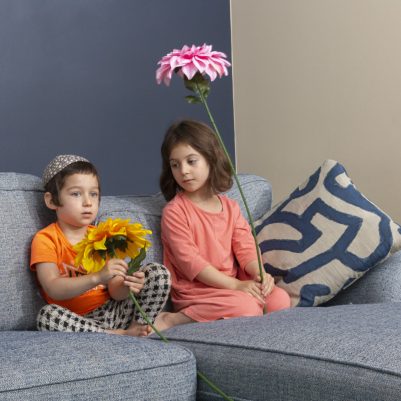 Kids holding flowers