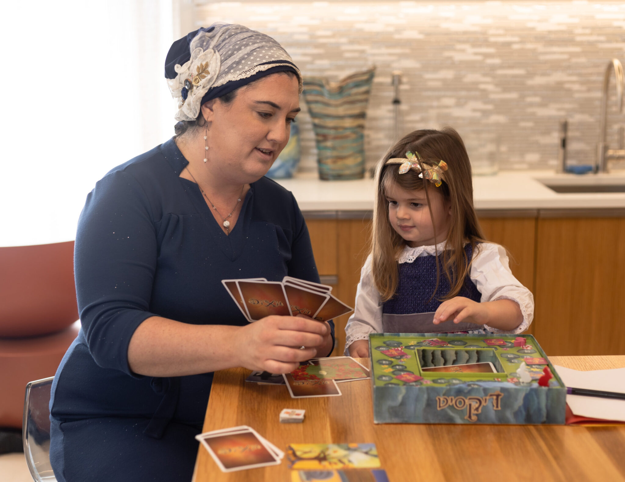 Mother and daughter playing board game 2 - The Jewish Life Photo Bank