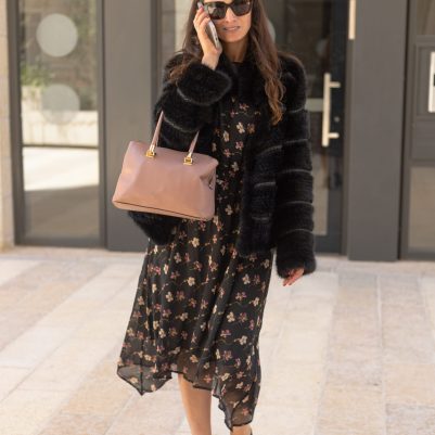 Woman talking on phone outside 2