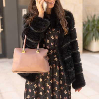 Woman talking on phone outside