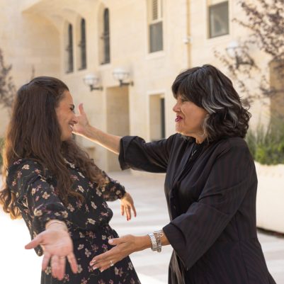 Two women hugging