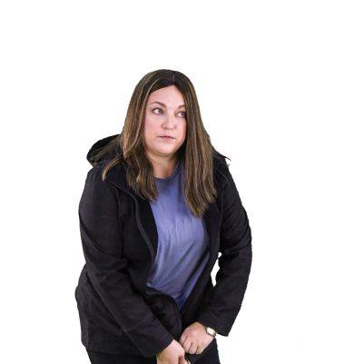 Woman zipping up coat 2