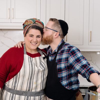 Smiling couple in kitchen 1