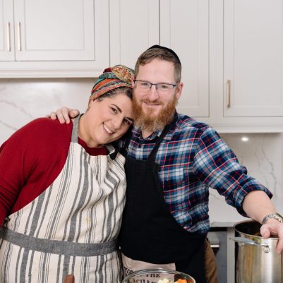 Smiling couple in kitchen 2