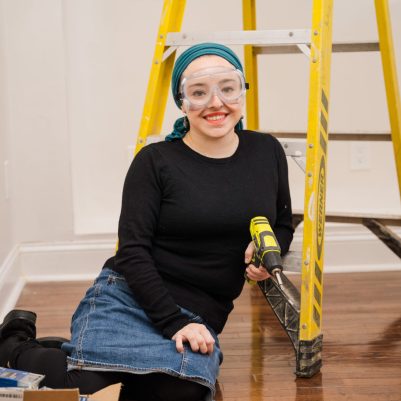 Woman with home improvement tools 1