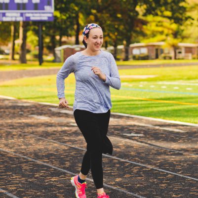 Woman running on track 2