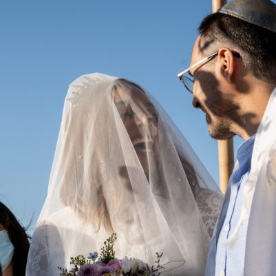 Bride and Groom under chuppah