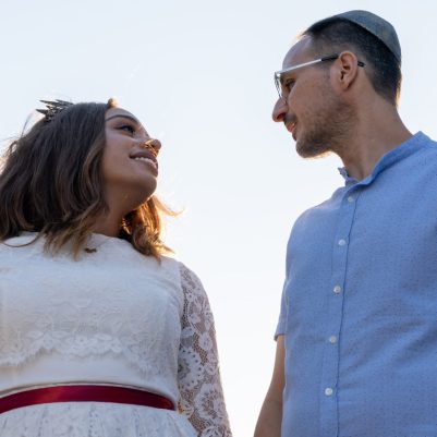 Bride and Groom holding hands