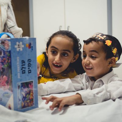 Kids opening Chanukah gifts 2