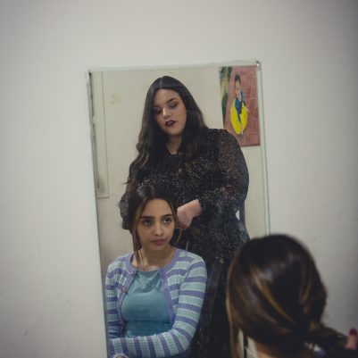 Mother braiding daughter's hair 2