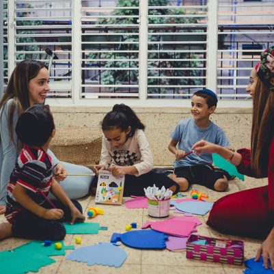 Family making Chanukah arts and crafts 2