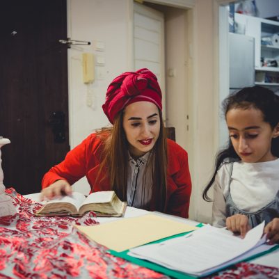 Mother helping daughter with homework 2