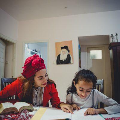 Mother helping daughter with homework 3