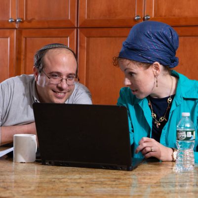Couple looking at computer 1
