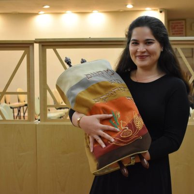 Woman holding Torah 1