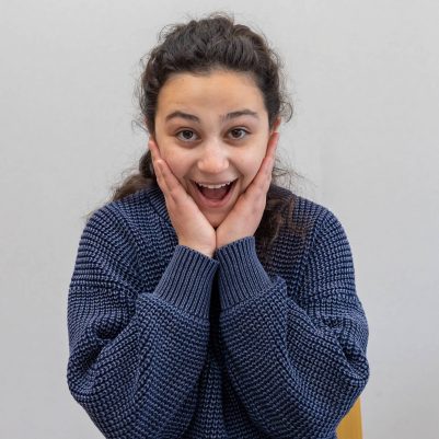 Young woman acting surprised