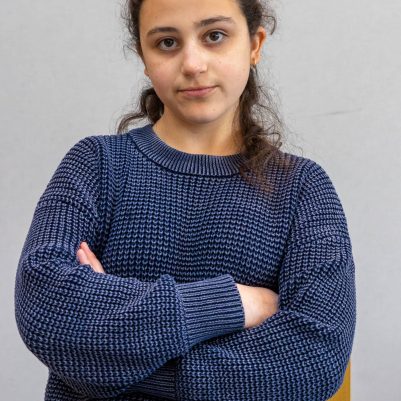 Young woman frowning