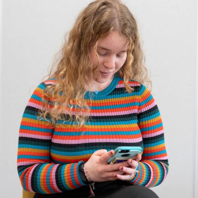 Young woman looking at phone 3