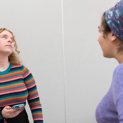 Woman reprimanding teenager about phone 3