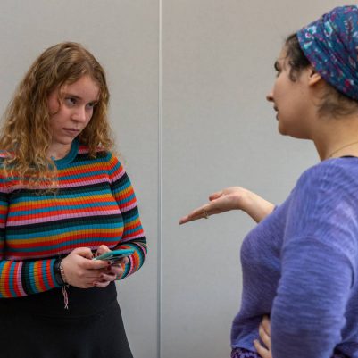 Woman reprimanding teenager about phone 4